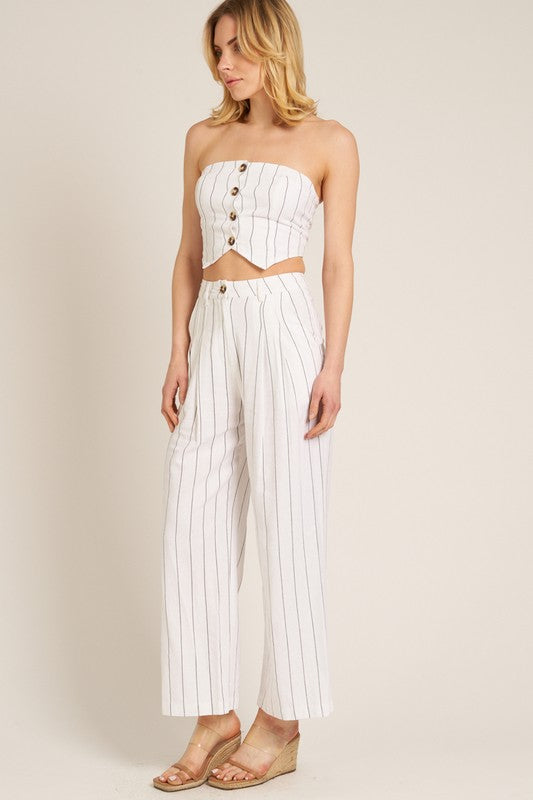 model is wearing Cream Black Striped Tube Pants Set and wedges 