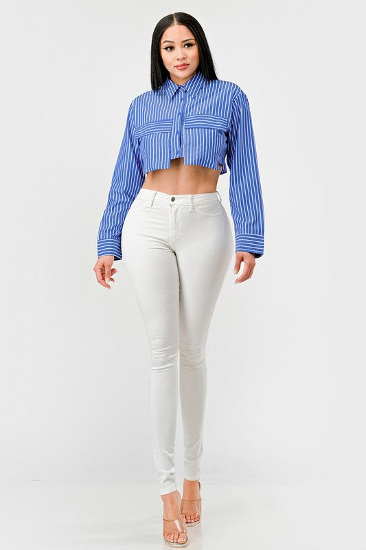 model is wearing Blue Stripe Poplin Cropped Top with white skinny pants and high heels 
