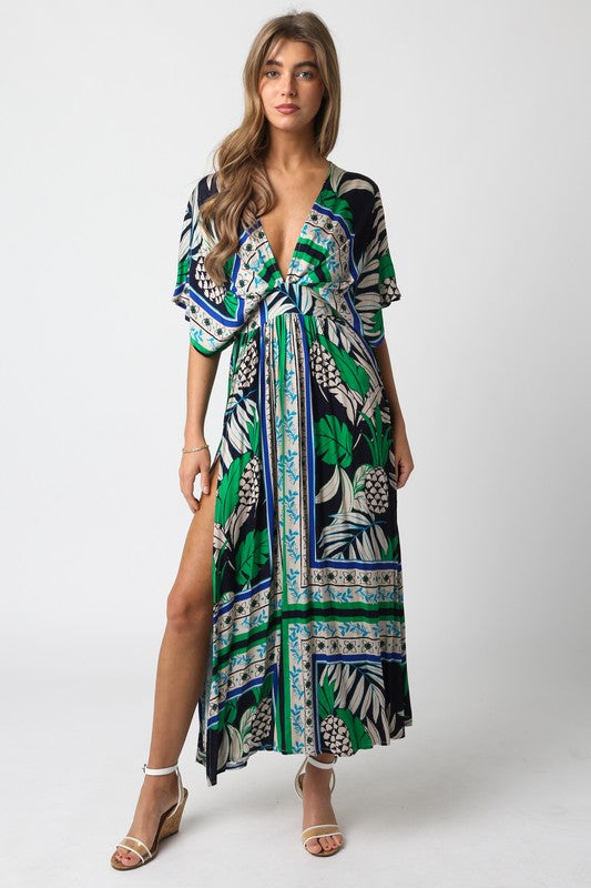 model is wearing Navy Green Anna Cover Up Dress with white wedge sandals