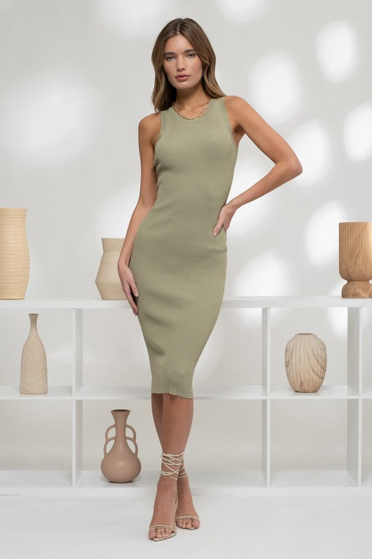 model is wearing Olive Ribbed Tank Midi Dress with silver lace up heels 
