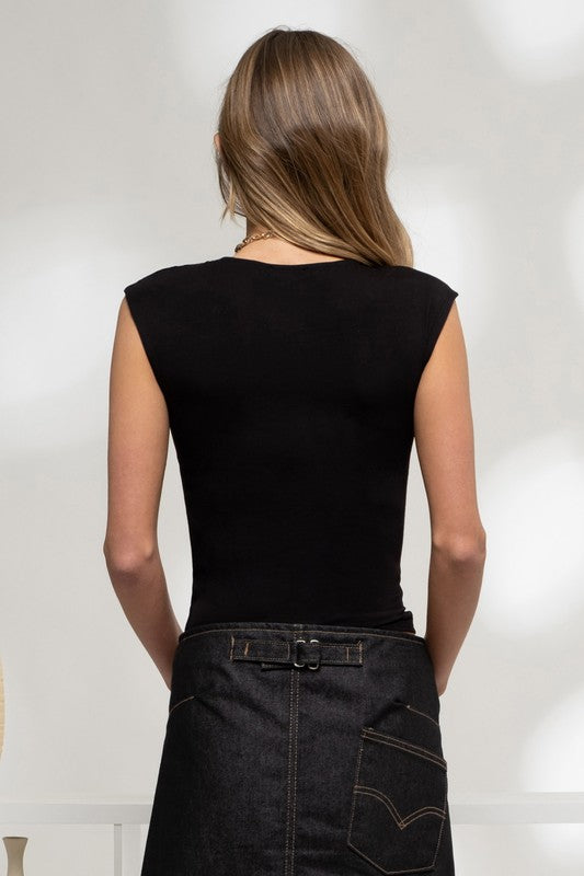 back of the Black Reversible Knit Sleeveless Crop Top