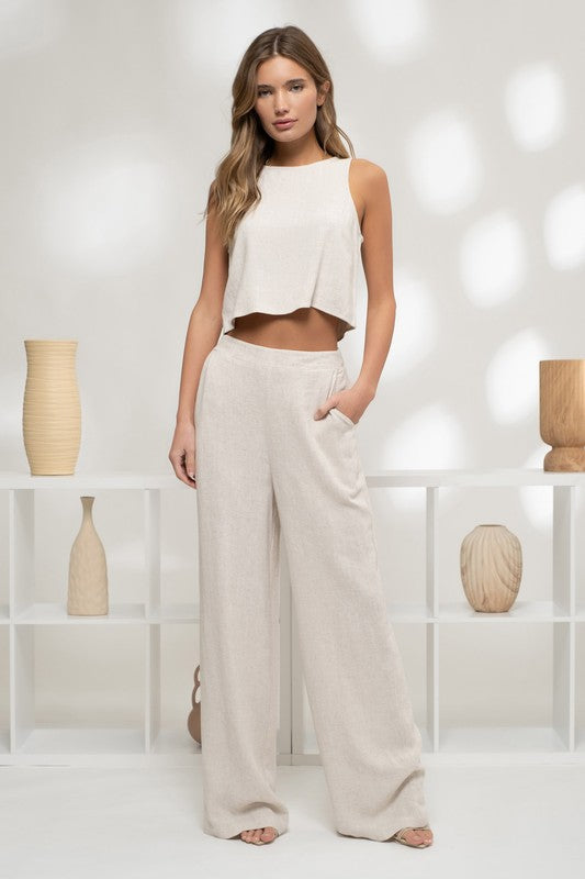 model is wearing Oatmeal Wide Leg Pants with matching linen top and high heels 