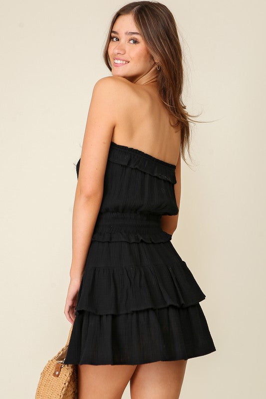 back of the Black Gauze Tiered Game Day Dress 