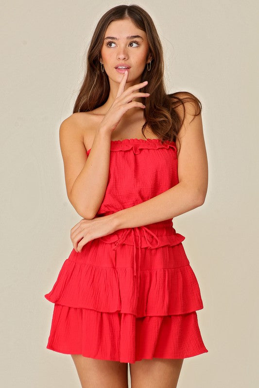 model is wearing Red Gauze Tiered Game Day Dress
