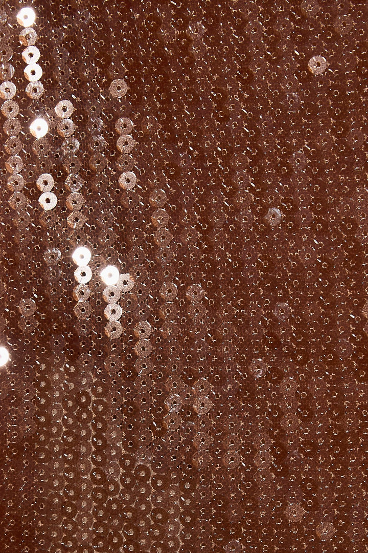 Close-up of the chocolate brown allover sequins on the A-line mini skirt