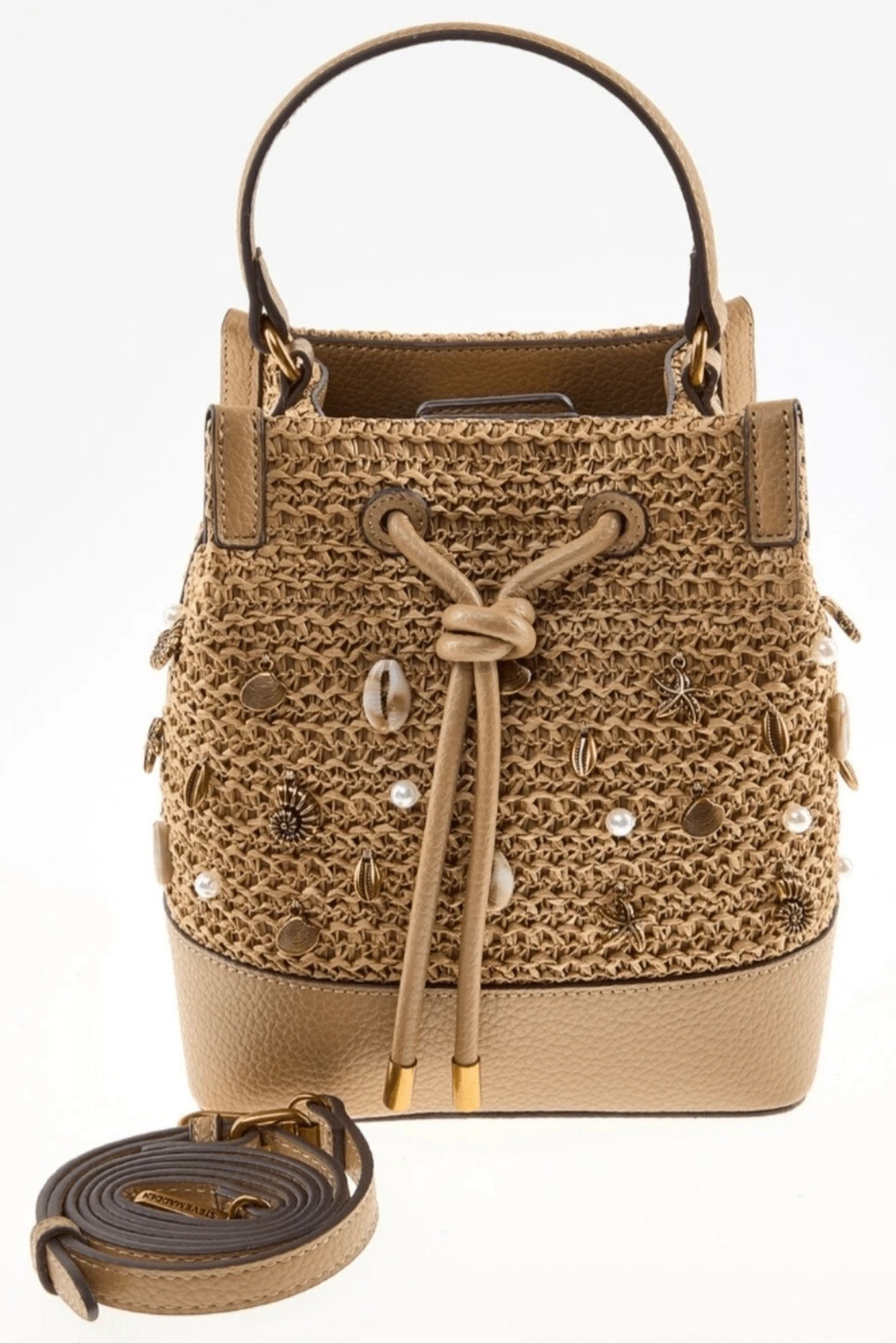 Steve Madden woven raffia bucket crossbody bag featuring shell, bead, and metallic stud embellishments