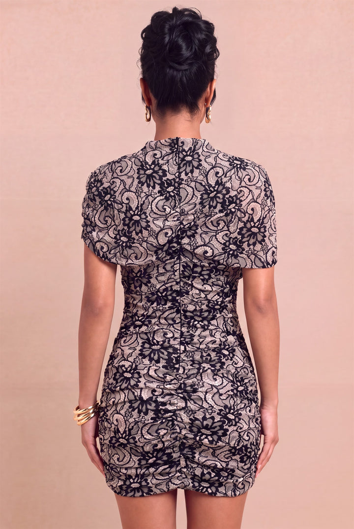 Back view of Luxxel black floral lace mini dress showing zip closure