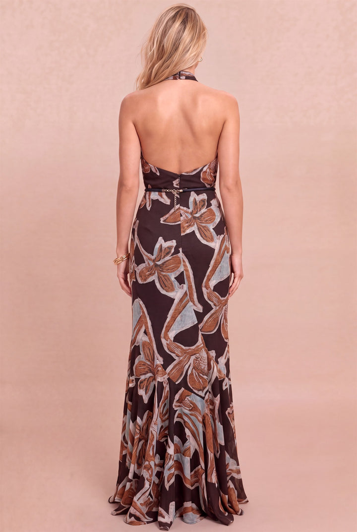 Back view of Luxxel abstract floral halter maxi dress showing the open back and slim waist belt