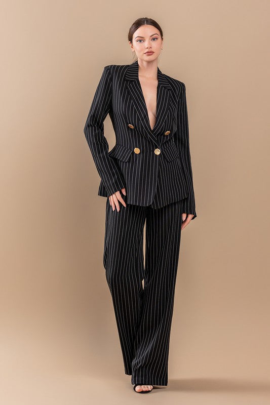 model is wearing Black Stripe Jacket Suit Set with black heels 