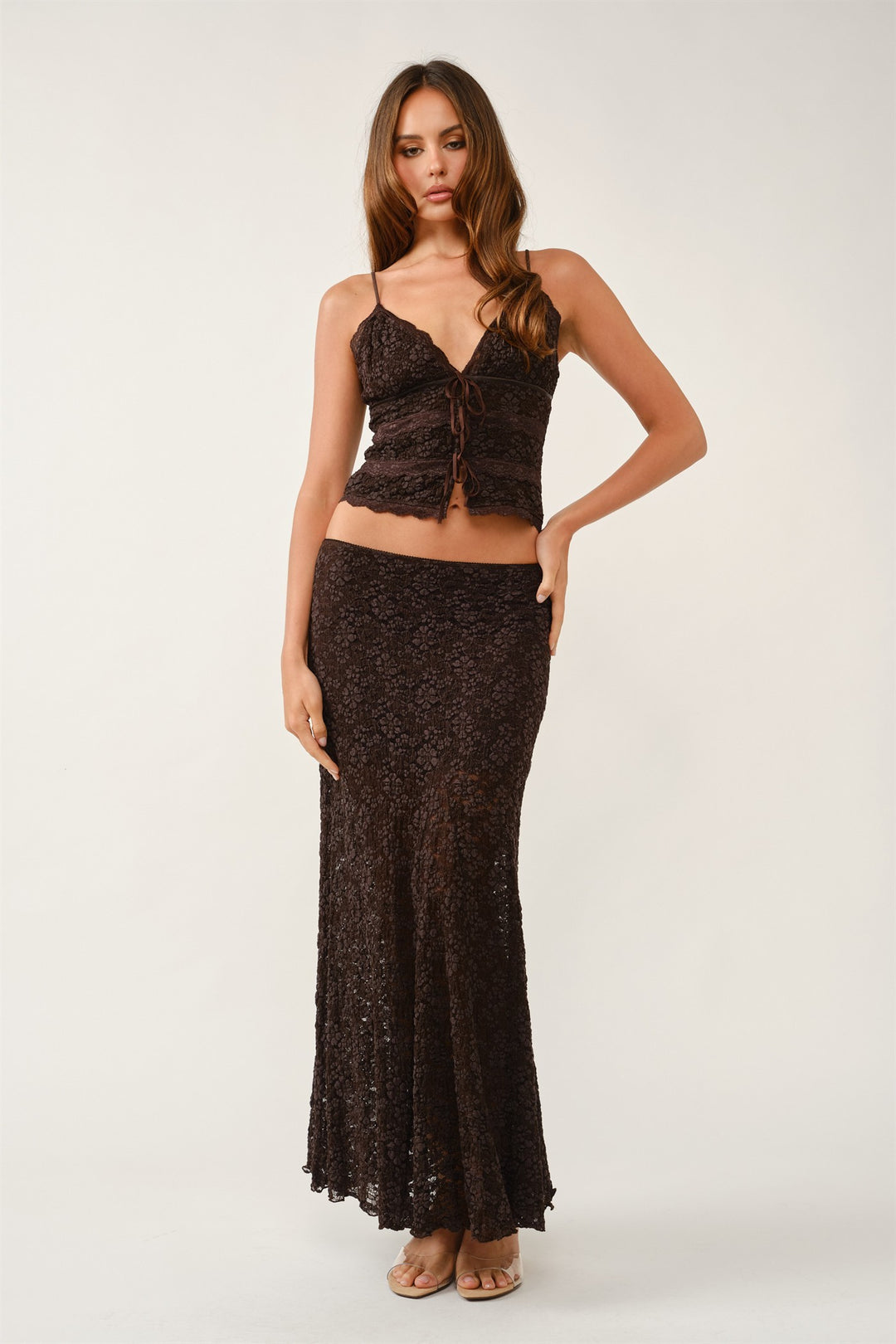 Front view of the brown lace tie front cami and matching maxi skirt, a romantic fall outfit for holiday parties