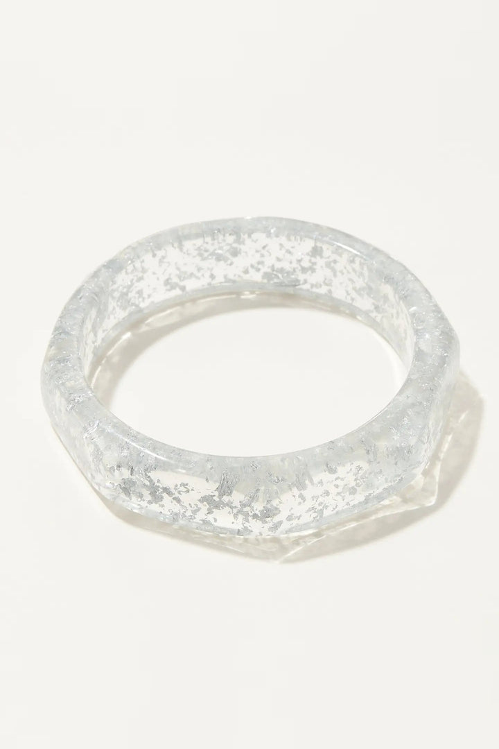 Clear oversized octagon resin bangle bracelet with a glassy finish