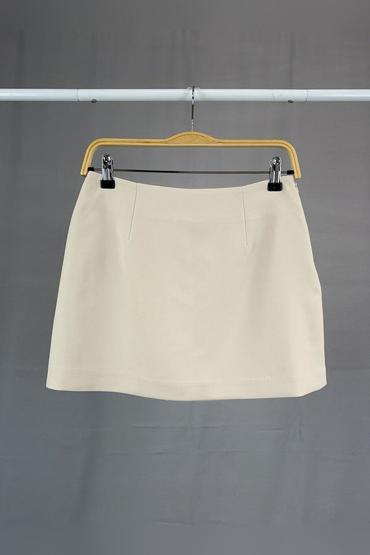 Beige mini skort with hidden built in safety shorts