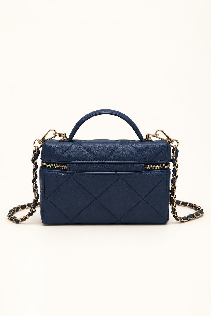 Back of the navy Snow quilted crossbody