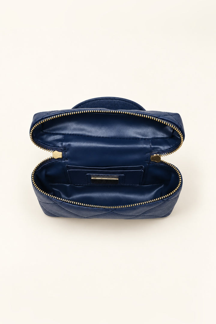 Lined interior of the navy Snow crossbody with card and slip pockets
