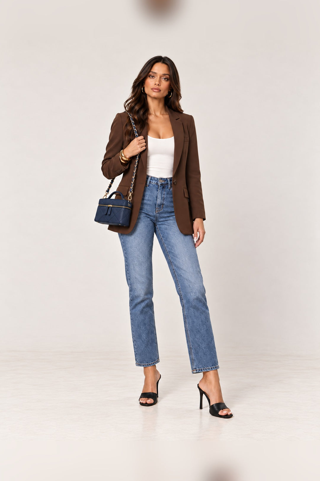 Navy Snow quilted crossbody styled with a full-length outfit