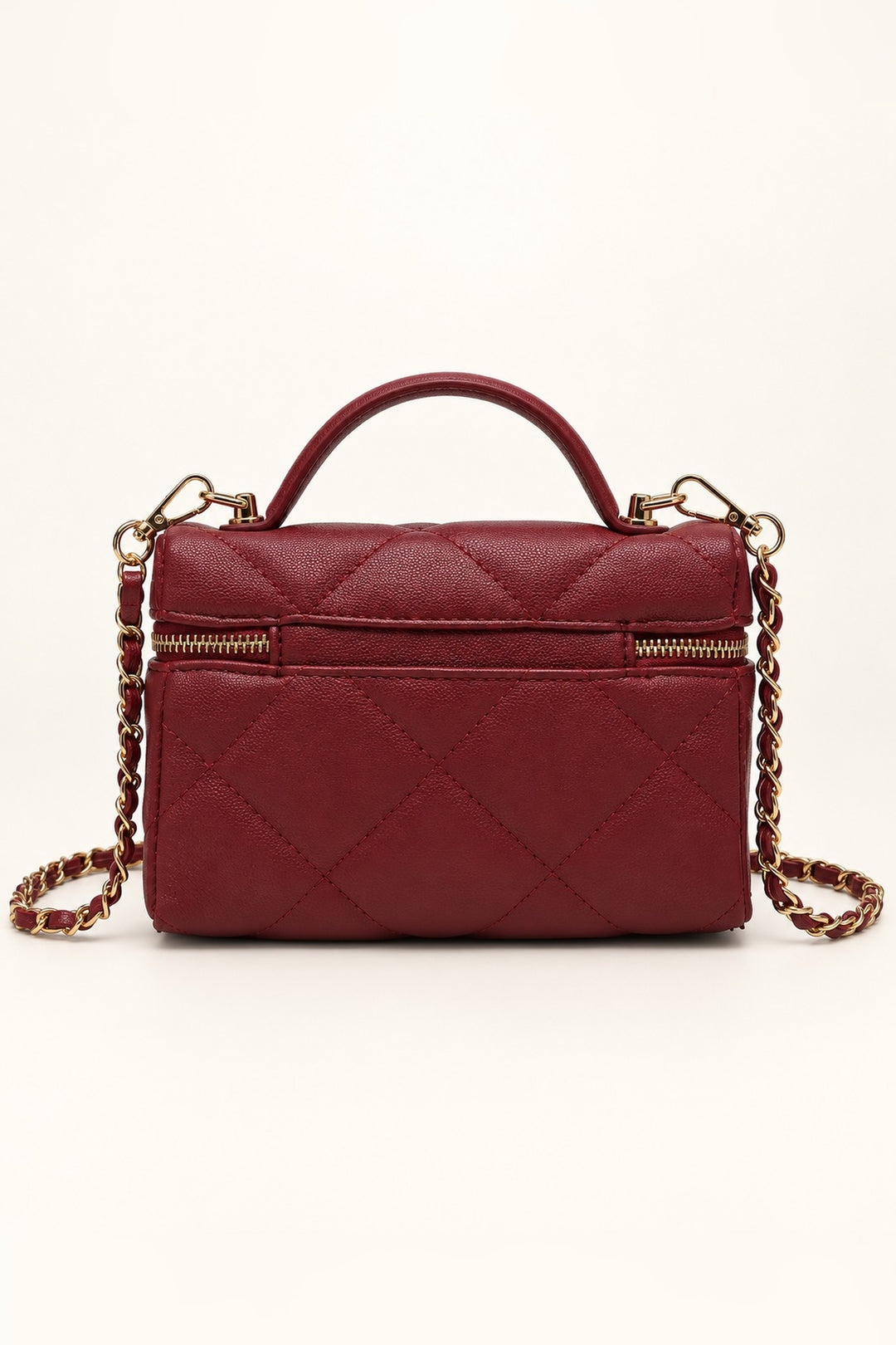 Back of the burgundy Snow quilted crossbody with rear slip pocket