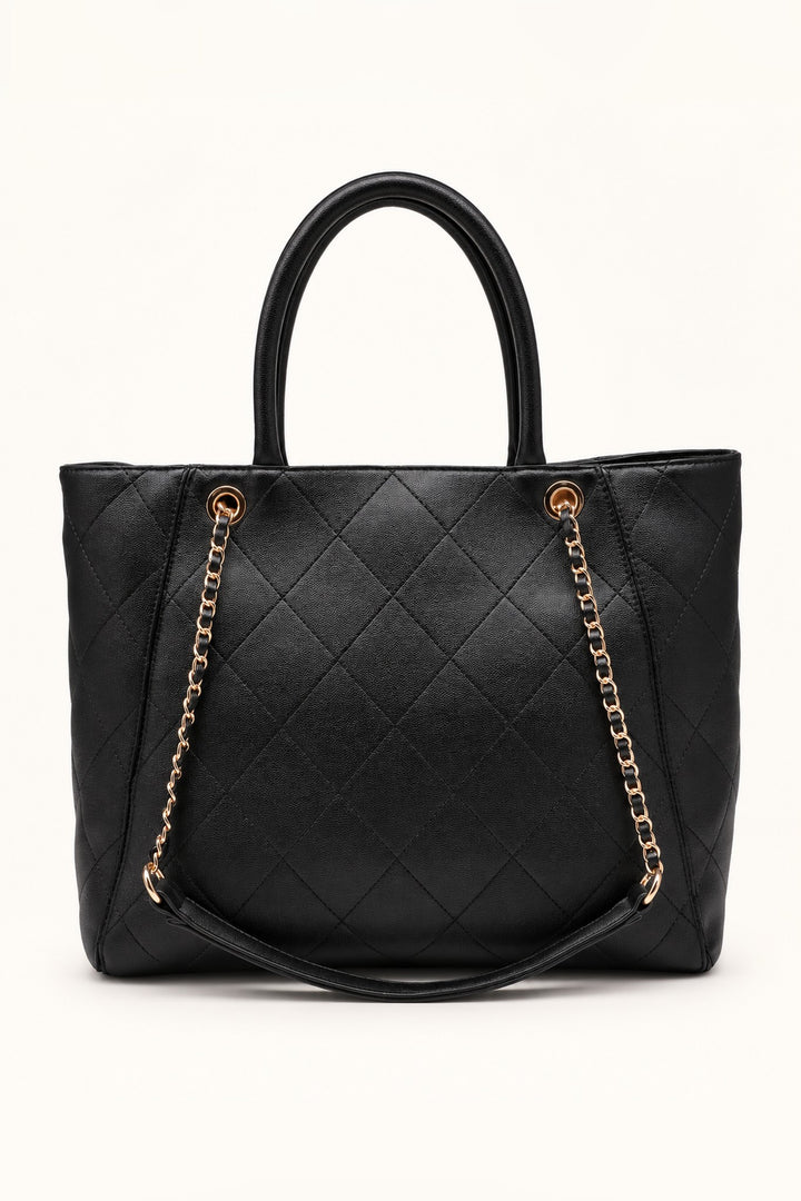 Back of the black diamond-quilted Hank tote