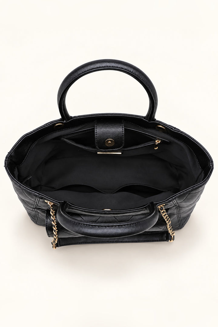 Fabric-lined interior of the black Hank tote with zip wall pocket and two slip pockets