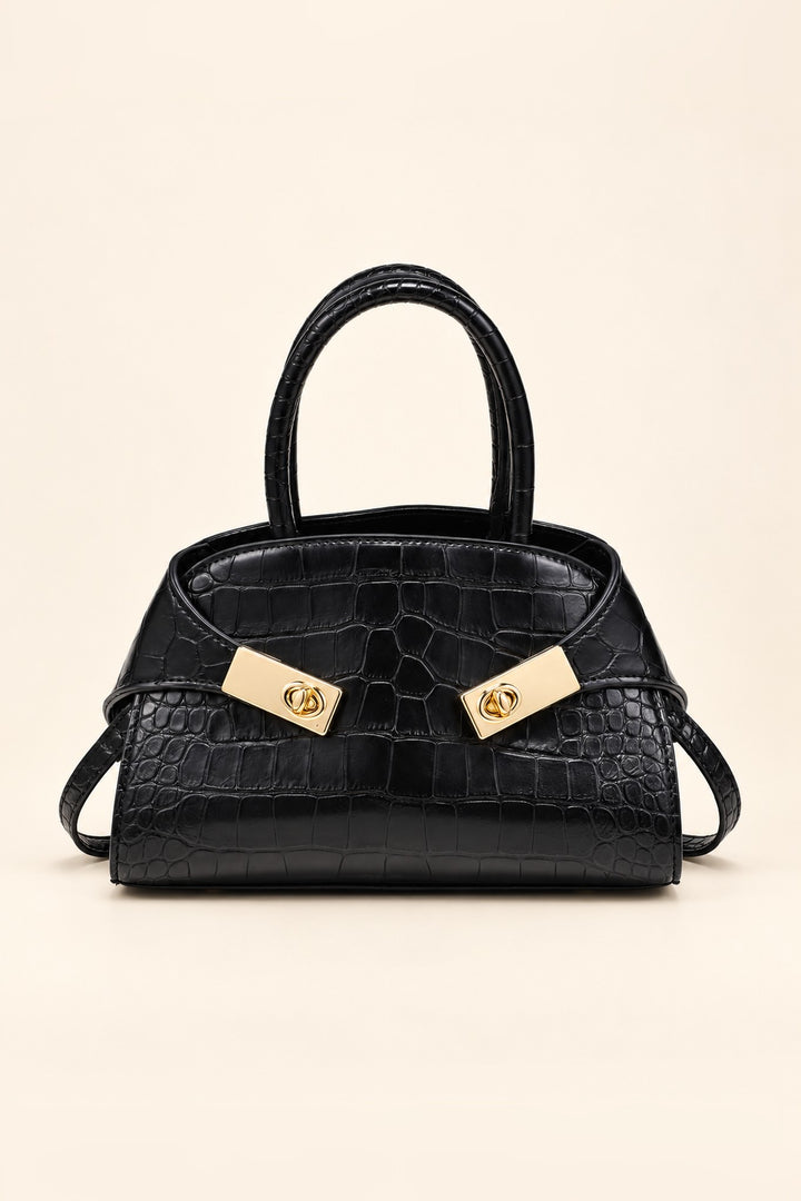 Black croc-embossed Fable crossbody with dual gold turn-lock plates and rolled top handles
