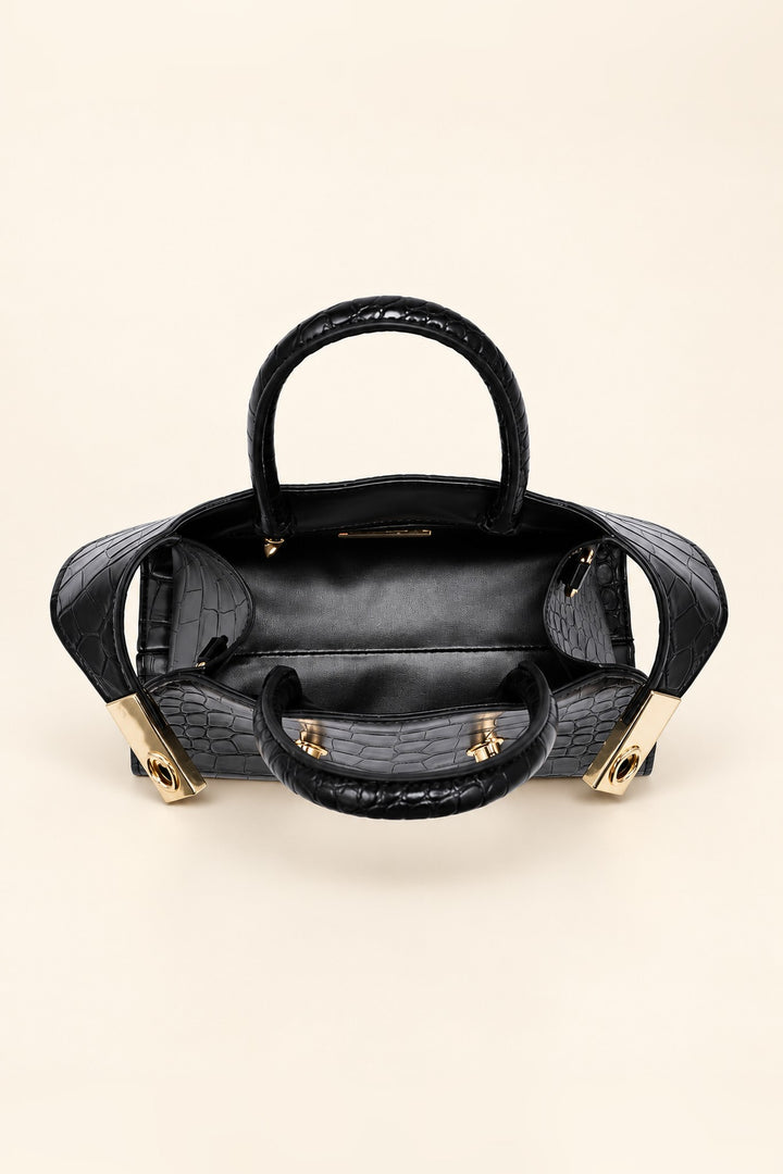 Lined interior of the black Fable crossbody with zip pocket and open slip pocket