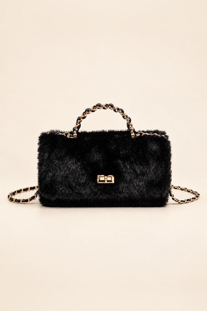 Black faux fur Lulu crossbody with gold-tone turn-lock closure and braided chain top handle