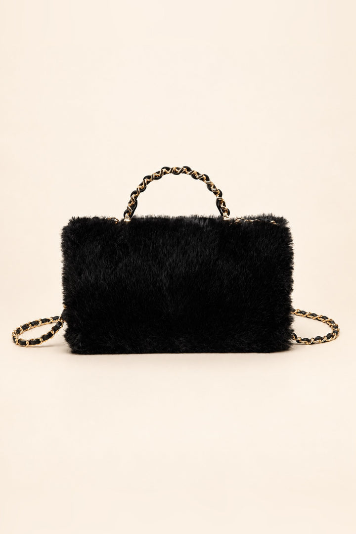 Back of the black faux fur Lulu crossbody with plush fur panel
