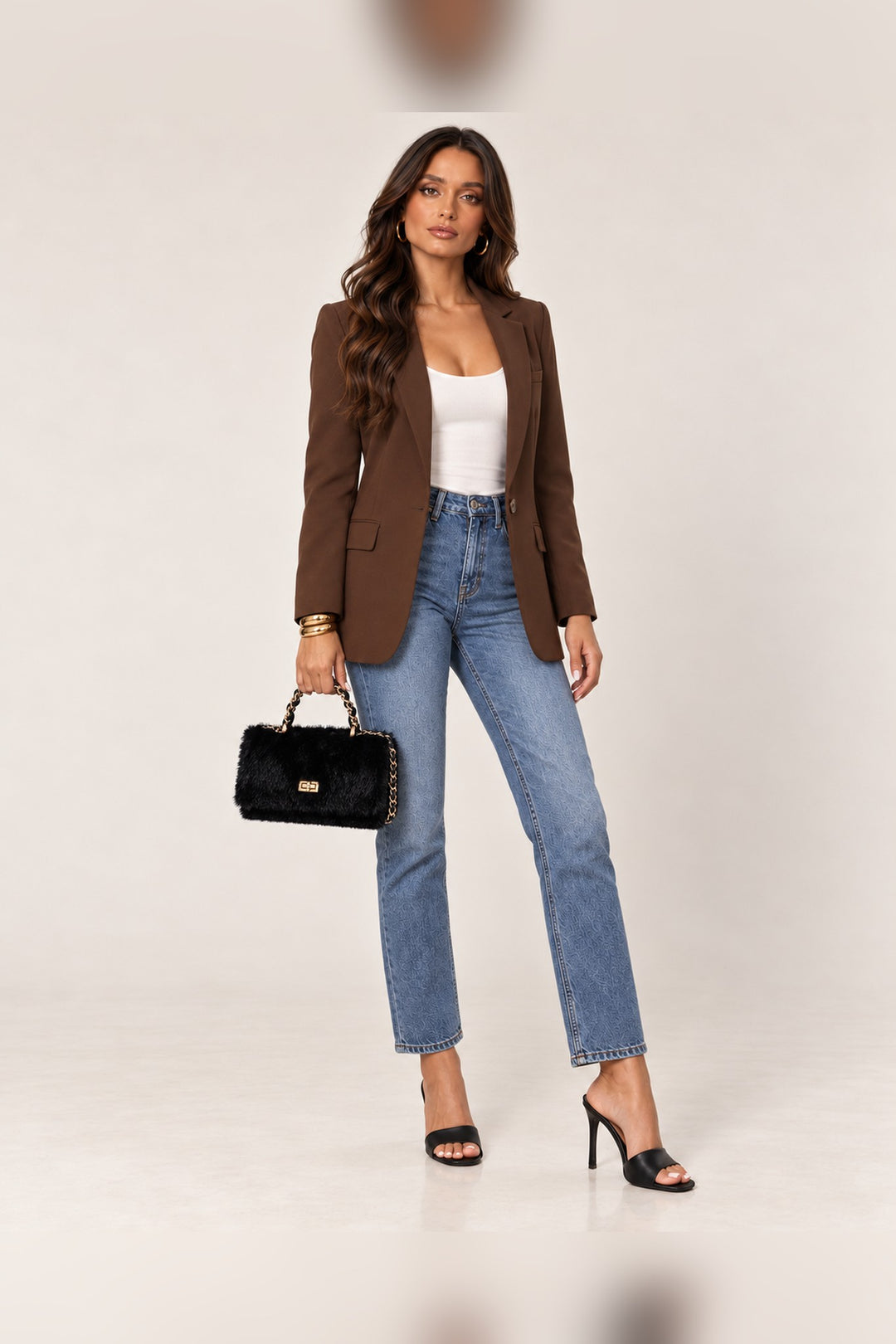 Black faux fur Lulu crossbody styled with a full-length outfit