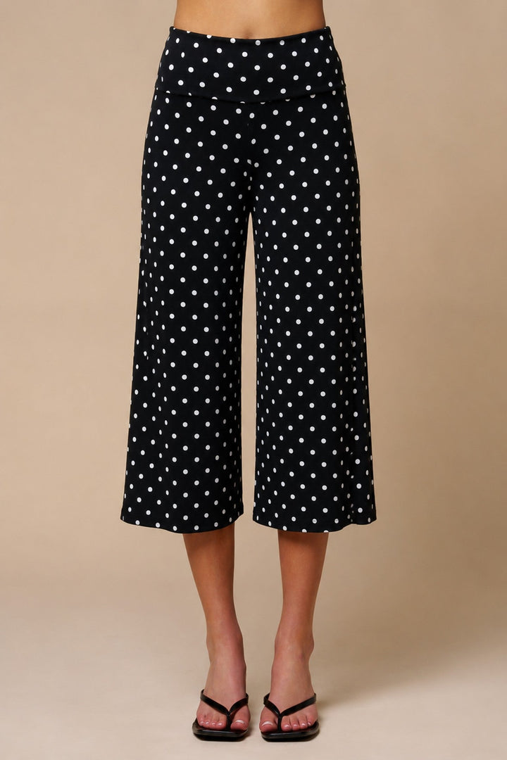 Front view of Blue Blush black off-white polka dot wide-leg crop pants with foldover waist