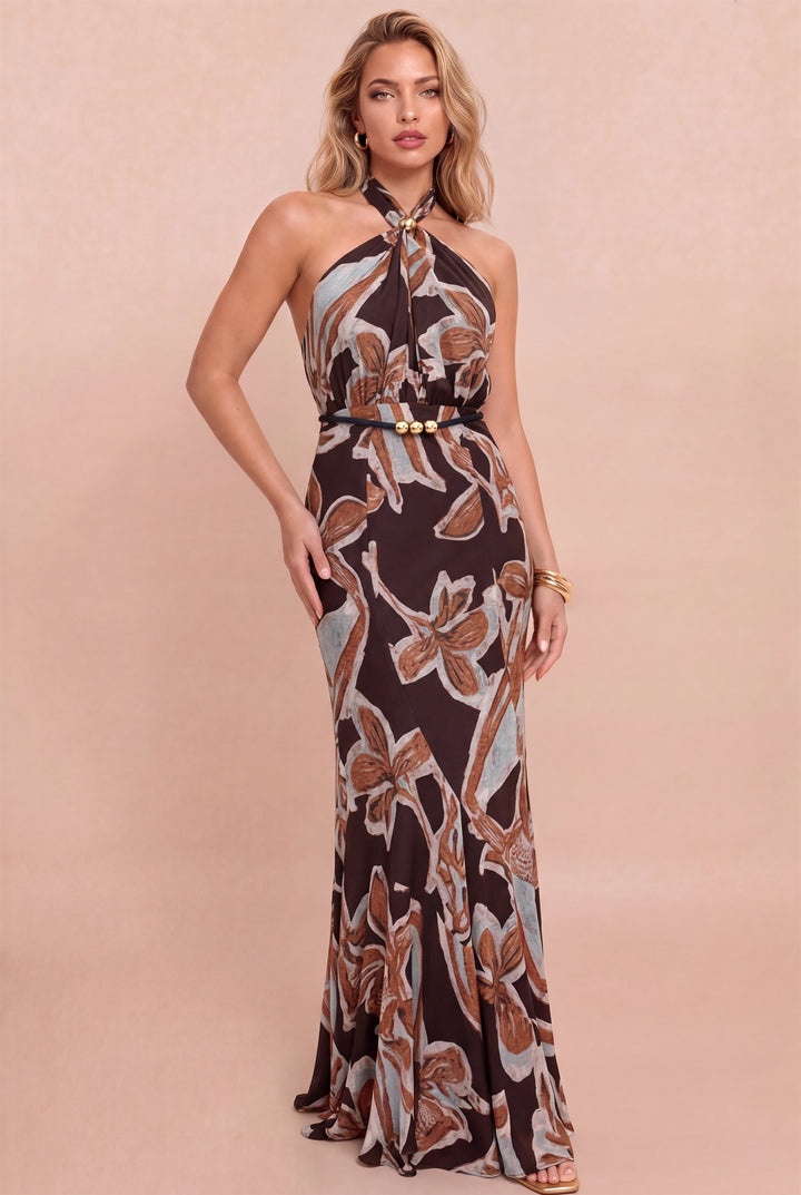 Front view of Luxxel abstract floral halter maxi dress in brown, black and pale blue with a gold-accent belt
