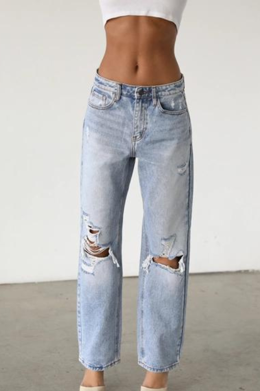 STYLED BY ALX COUTURE MIAMI BOUTIQUE Light denim straight jeans with ripped knees detail 