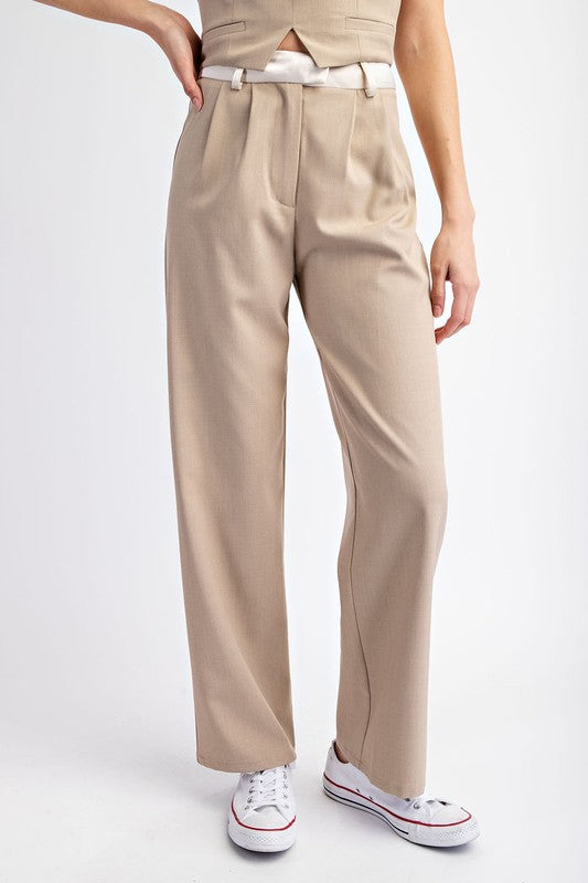 model is wearing Taupe Cream Contrast Satin Wide Pants with white sneakers 
