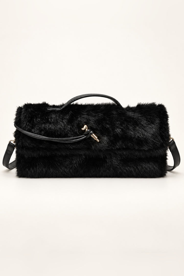 Front view of the Black Ada Faux Fur Crossbody Bag with top handle and gold-tone hardware