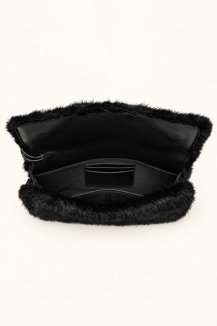 Open black Ada faux fur bag showing lined interior, slip pocket and card slots