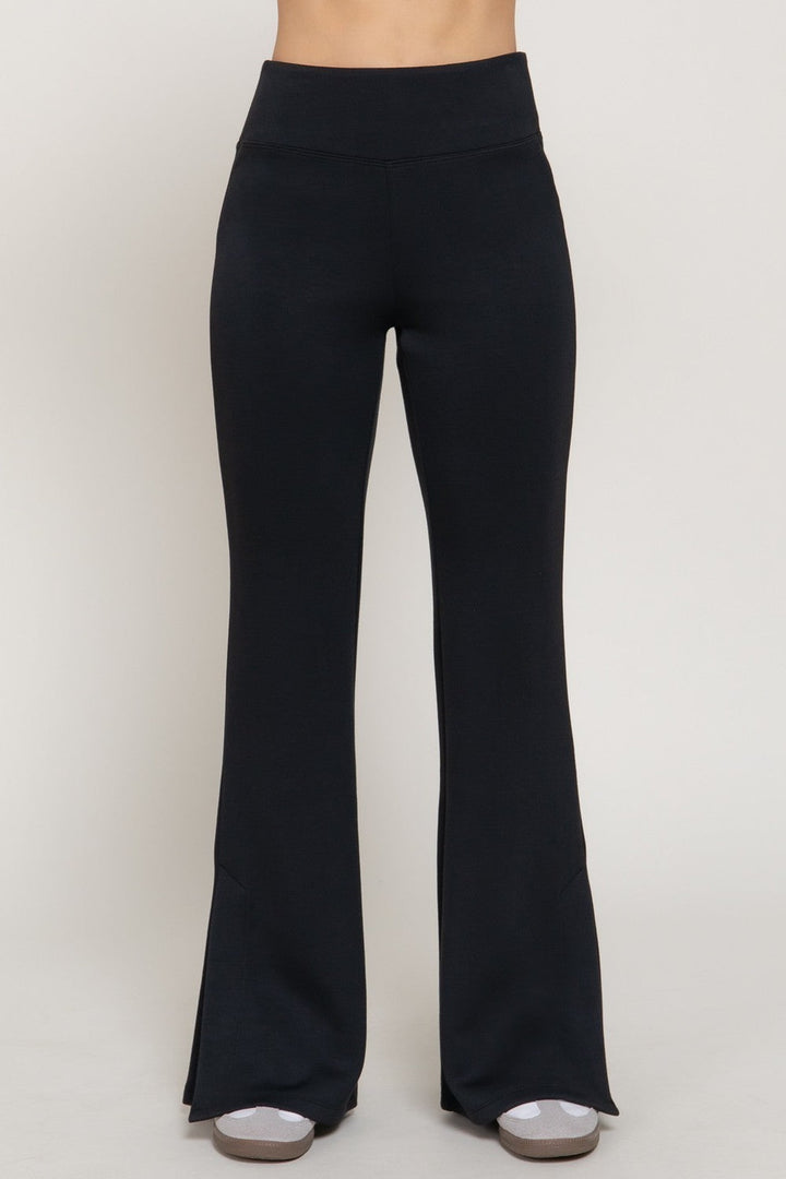 Black flare slit hem soft scuba pants, front view