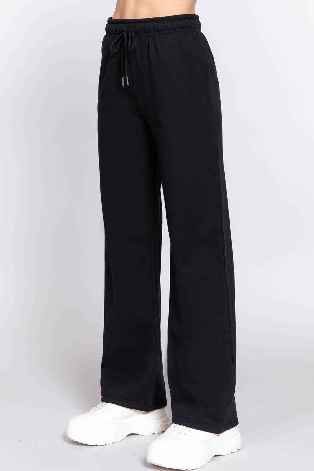 Front view of the black straight leg inner fleece jogger pants with drawstring waist and side pockets