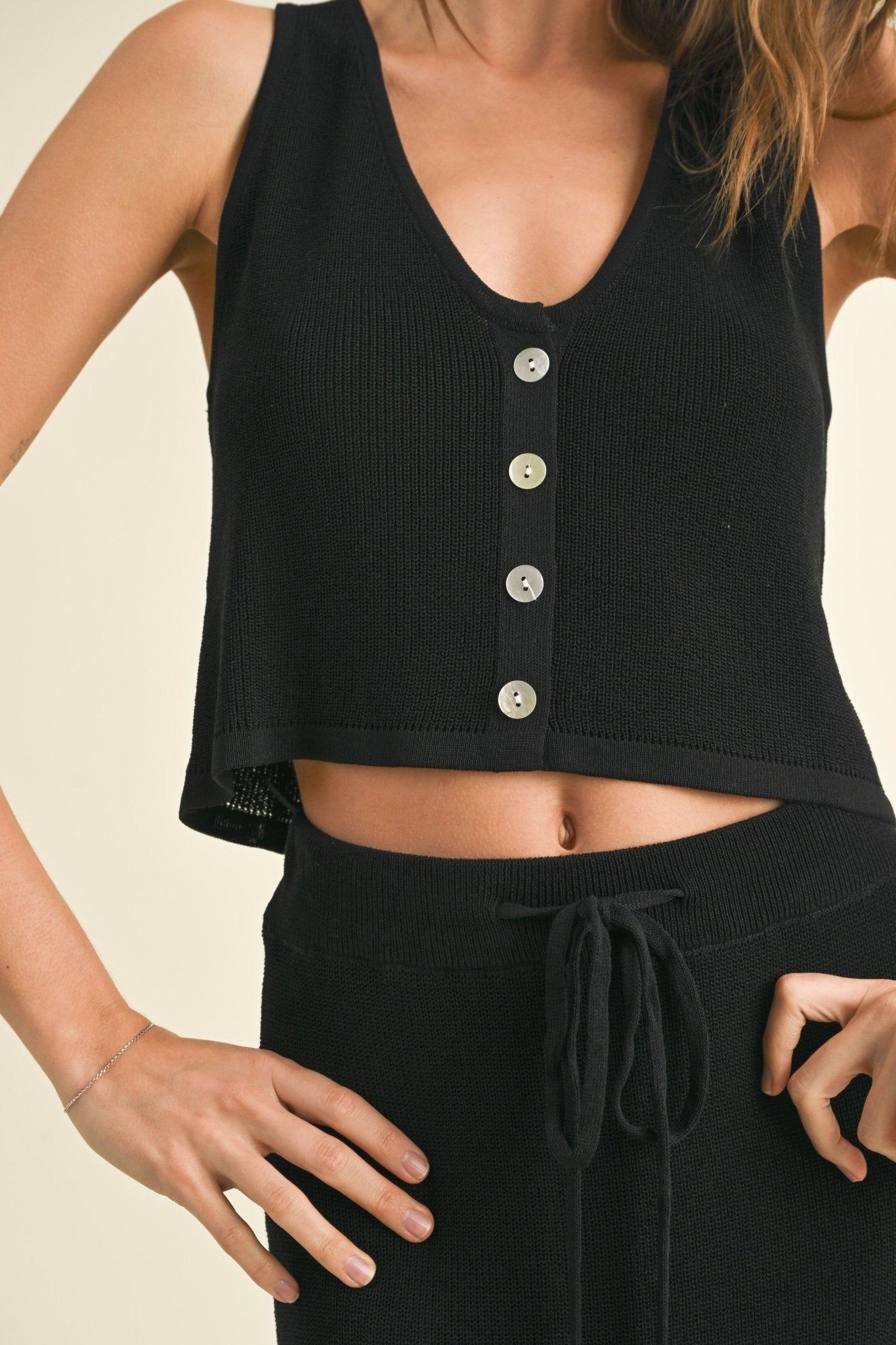 black flowy vest