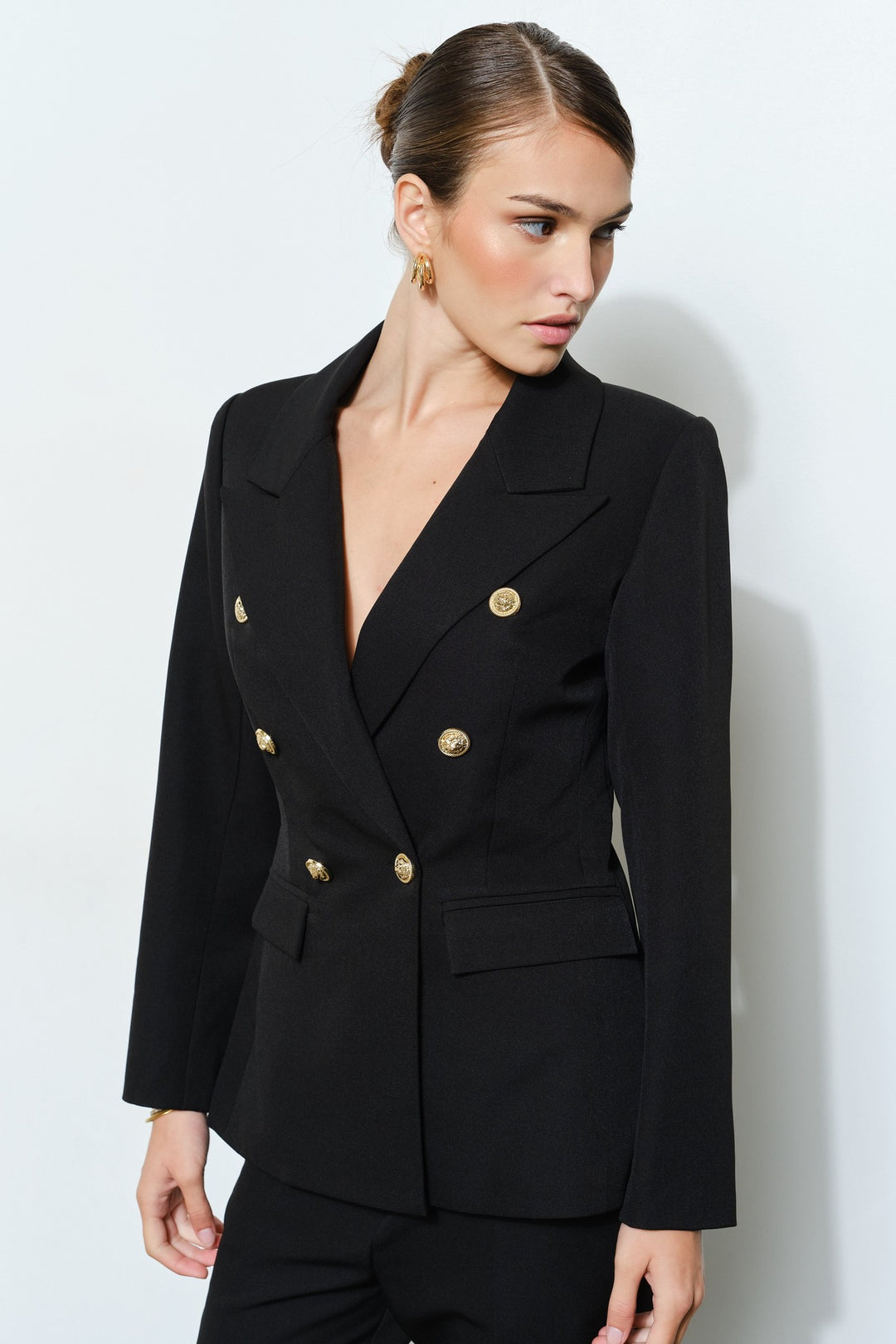 Black gold button tailored blazer, three-quarter view