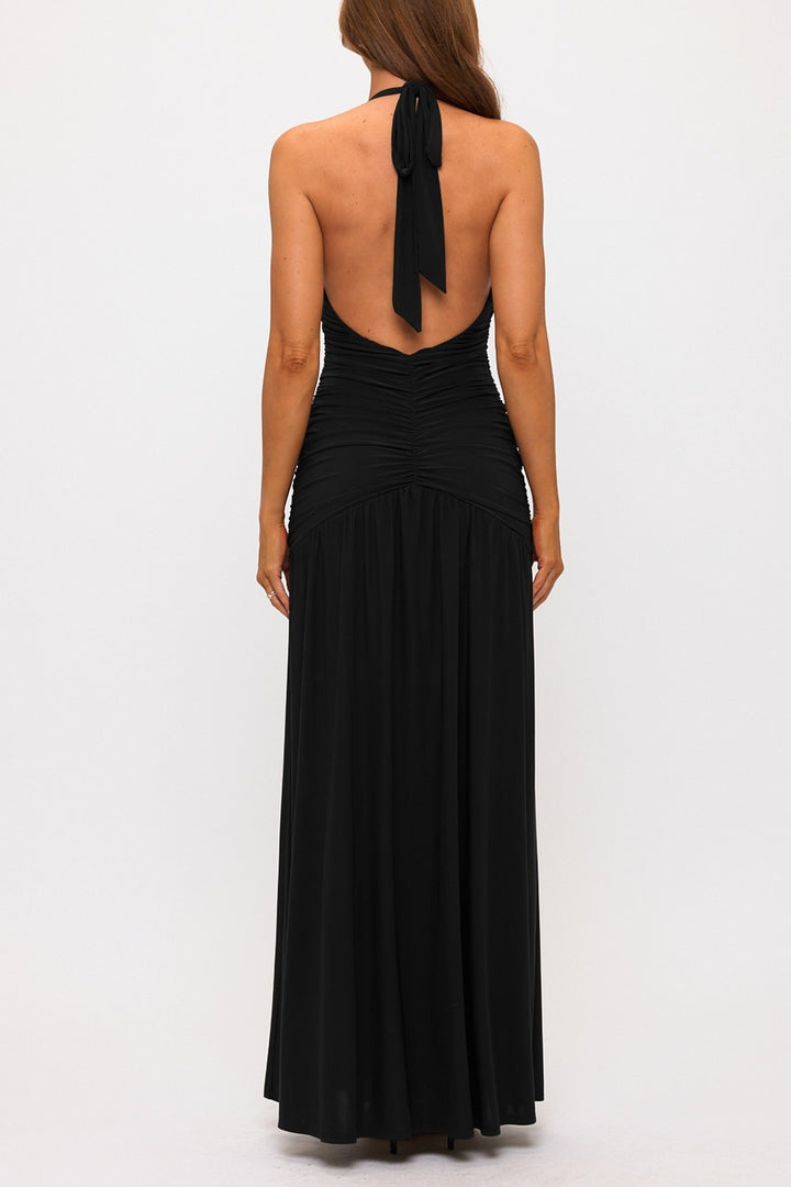 Black halter maxi dress showing the open back and tie, back view