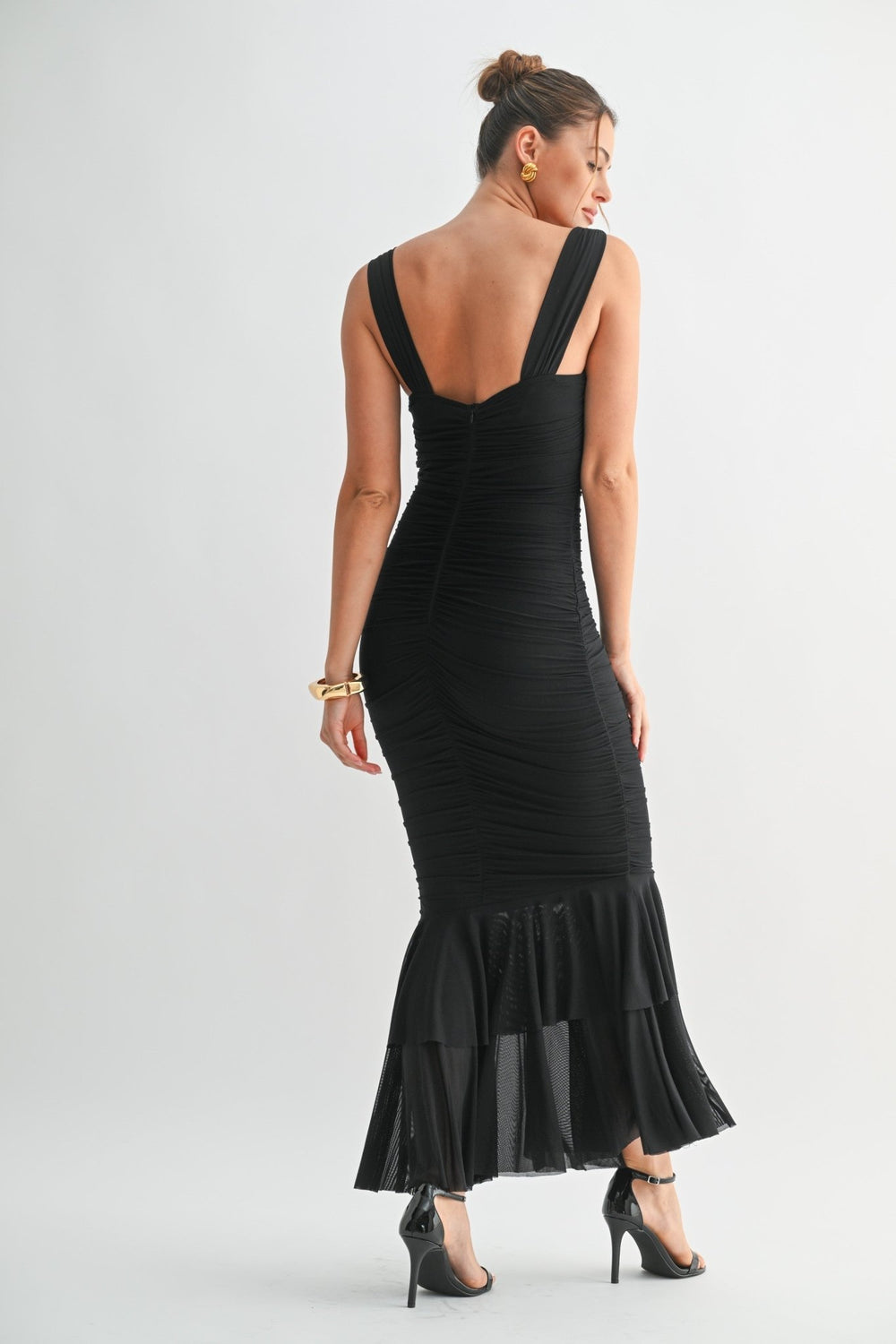 Layered mesh flounce detail on a black floor length dress