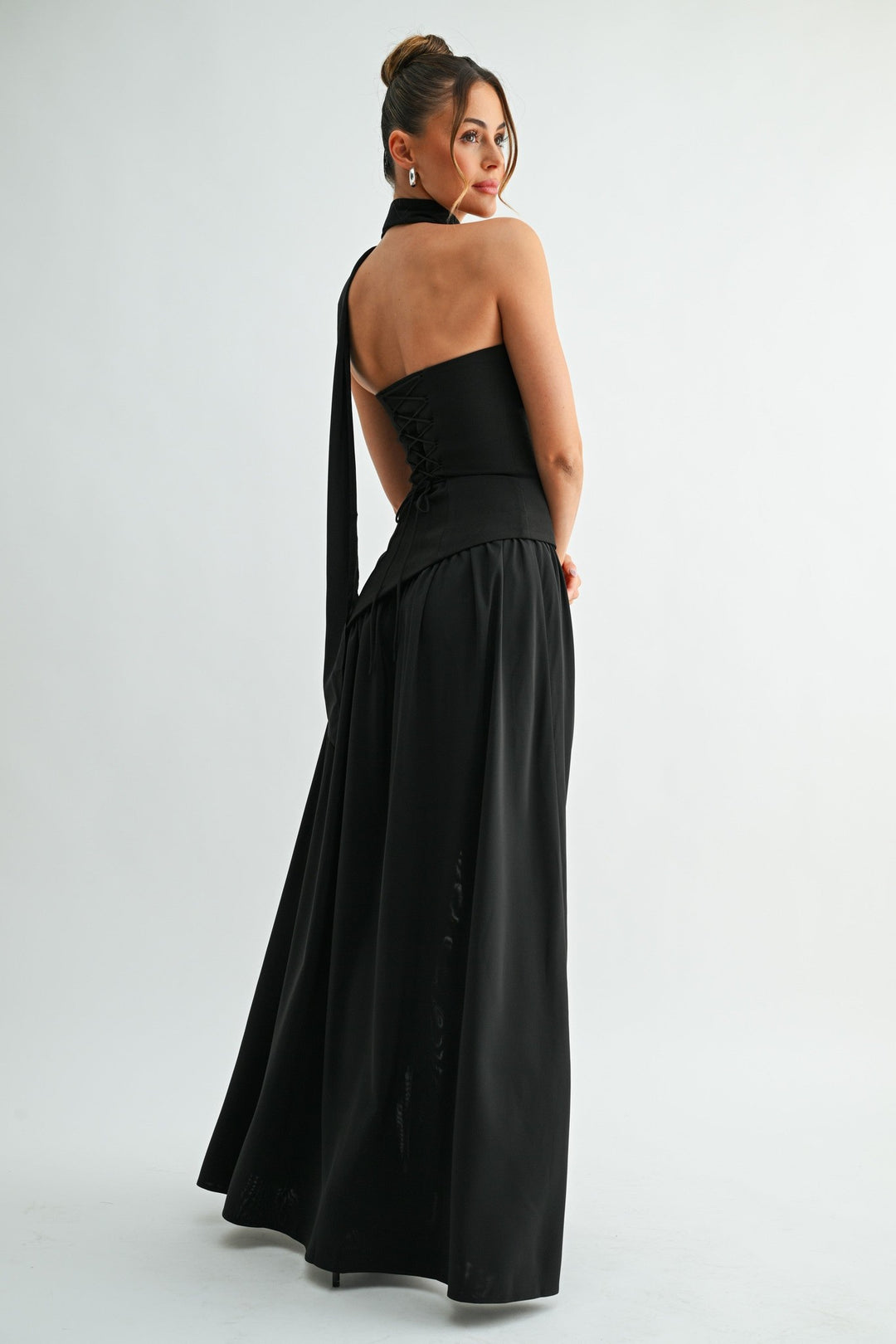 Black strapless Parisian lace-up maxi dress with scarf necktie and gathered skirt, front view