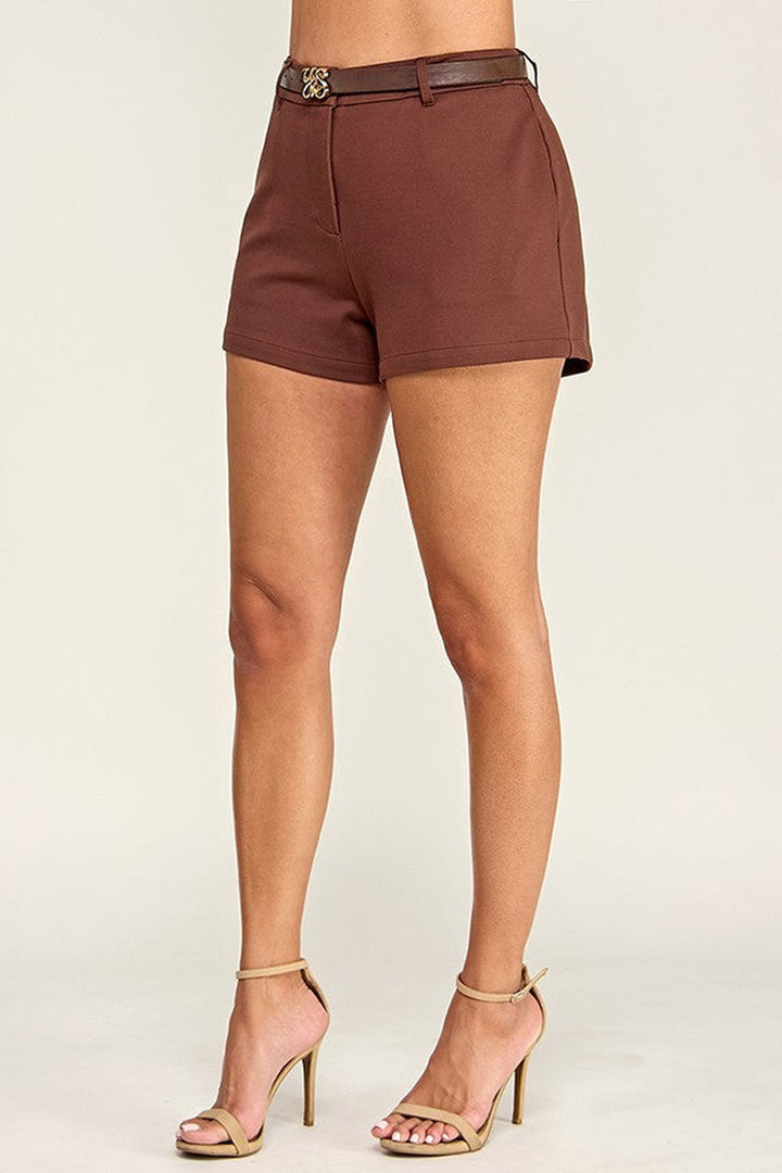 Brown tailored shorts, side view showing the fitted waistband