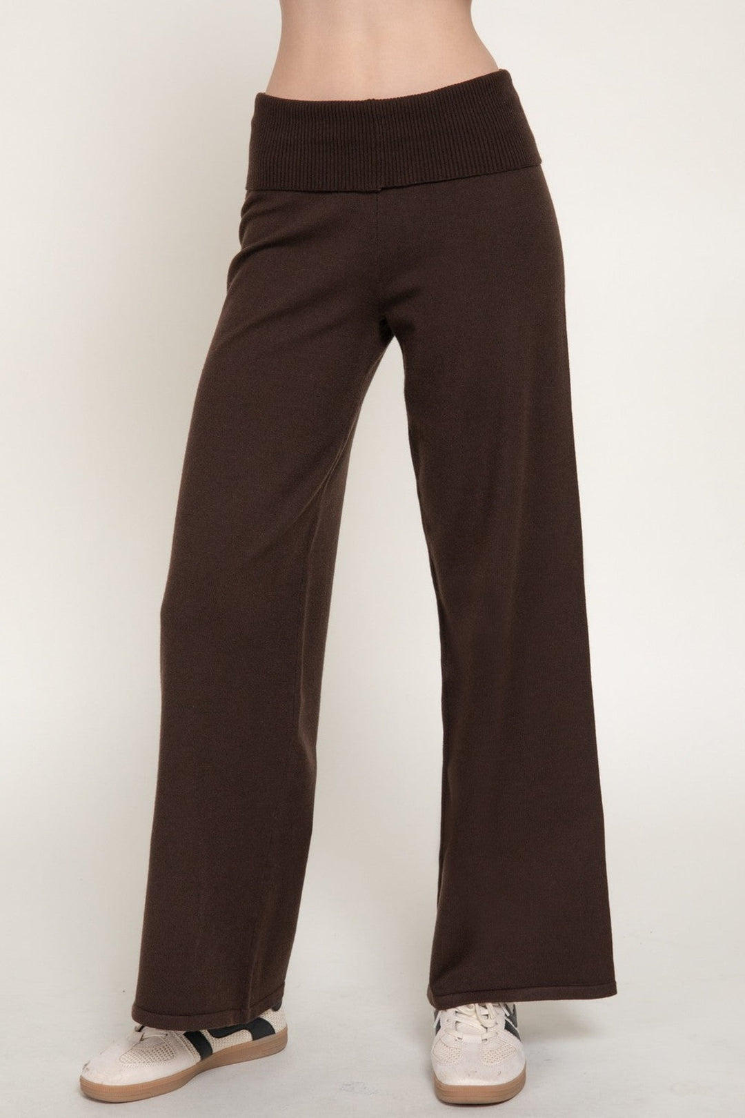 Side view of the brown wide leg knit pants with fold over waistband