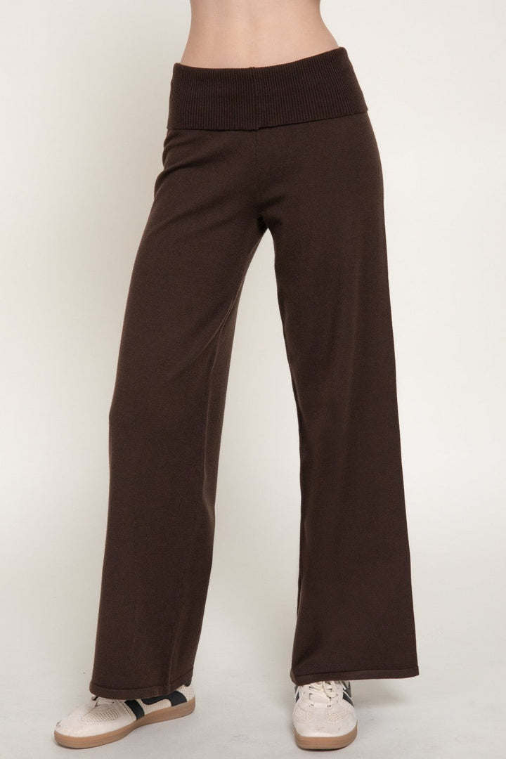 Side view of the brown wide leg knit pants with fold over waistband