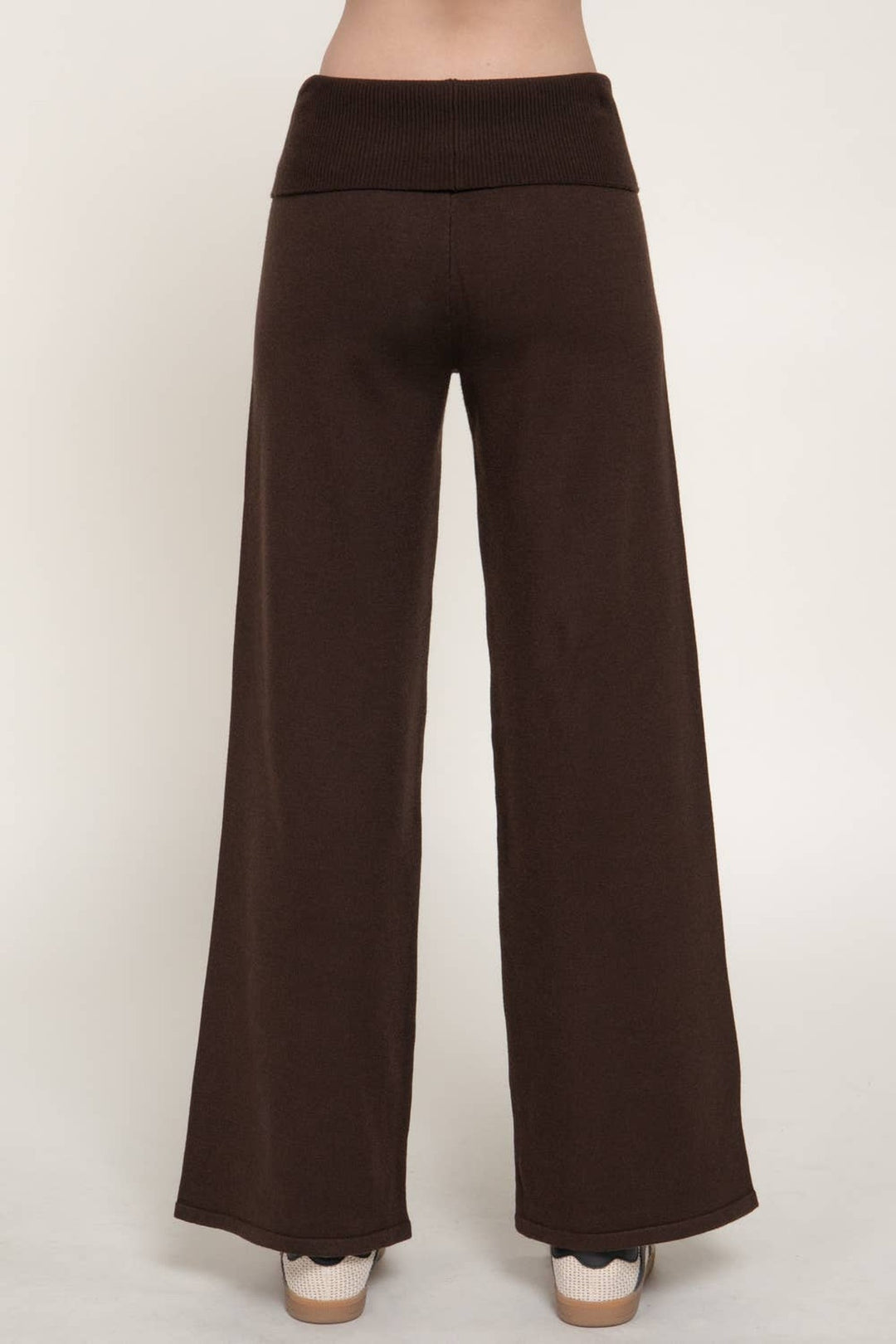 Back view of the brown fold over waist sweater pants with wide leg hem