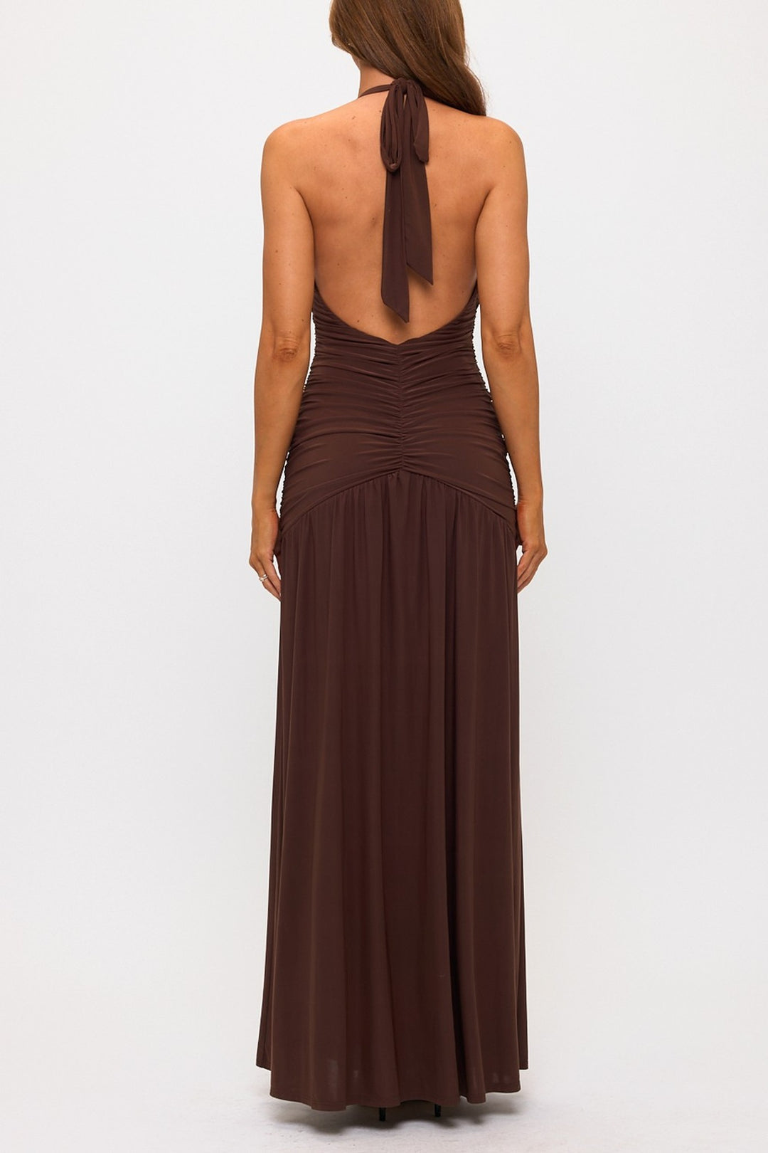 Brown halter maxi dress showing the open back and tie, back view