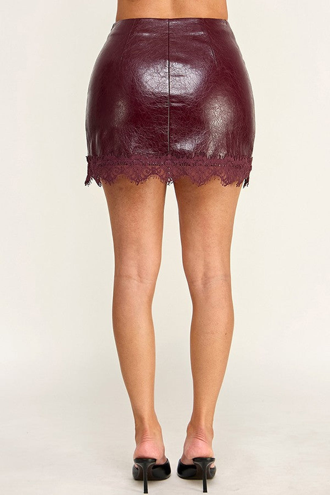 Lace hem faux leather mini skirt, back view, shown in burgundy
