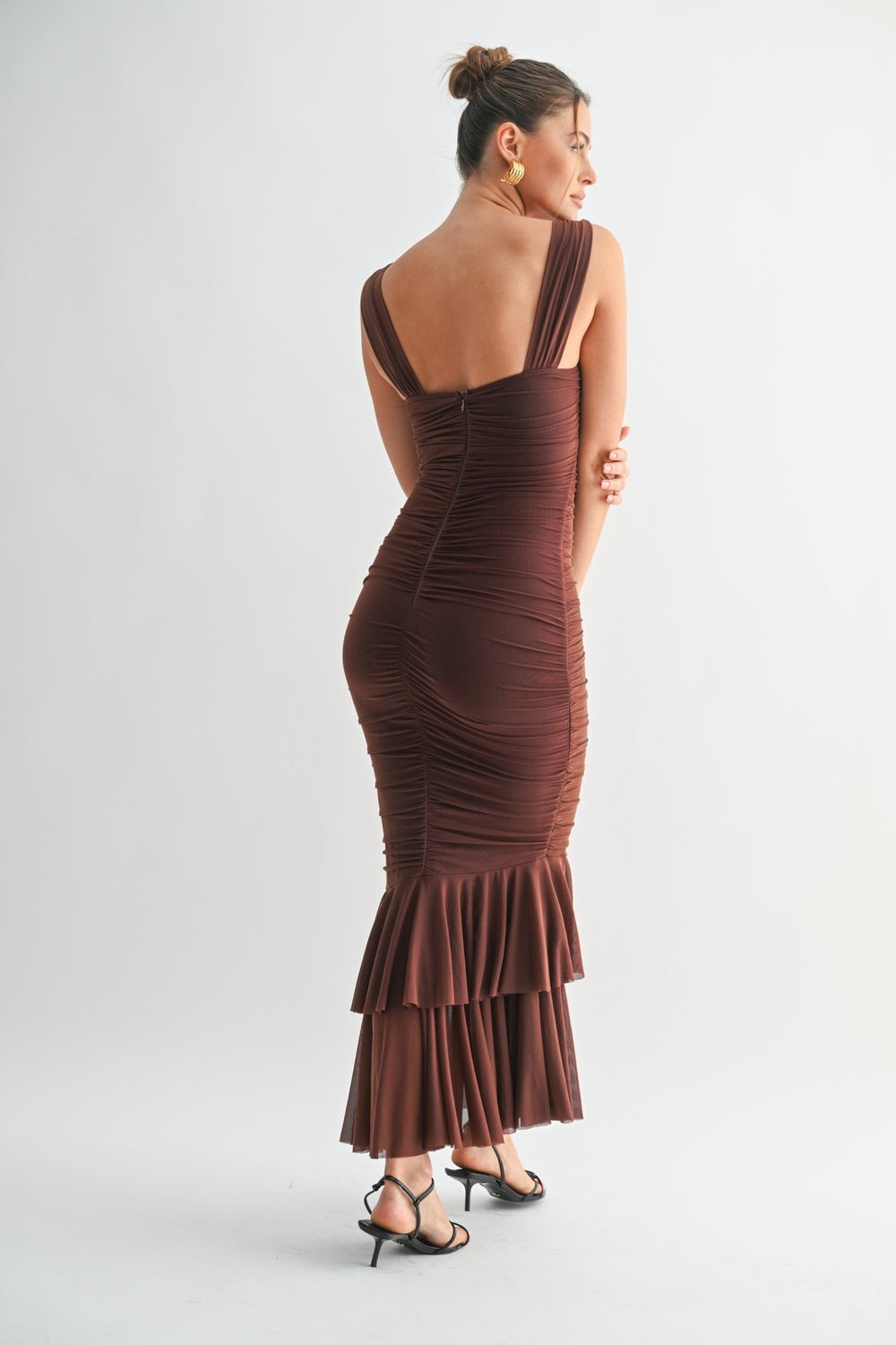 Brown maxi dress with a hidden back zipper and contoured fit