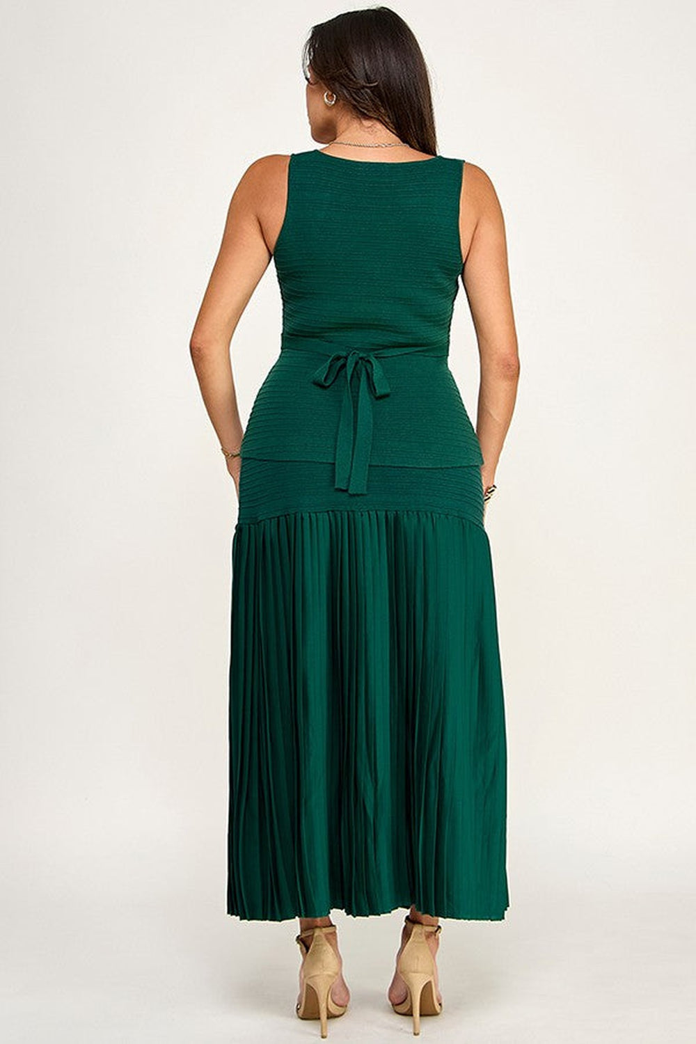 Sweater vest and pleated maxi skirt set, back view, shown in green