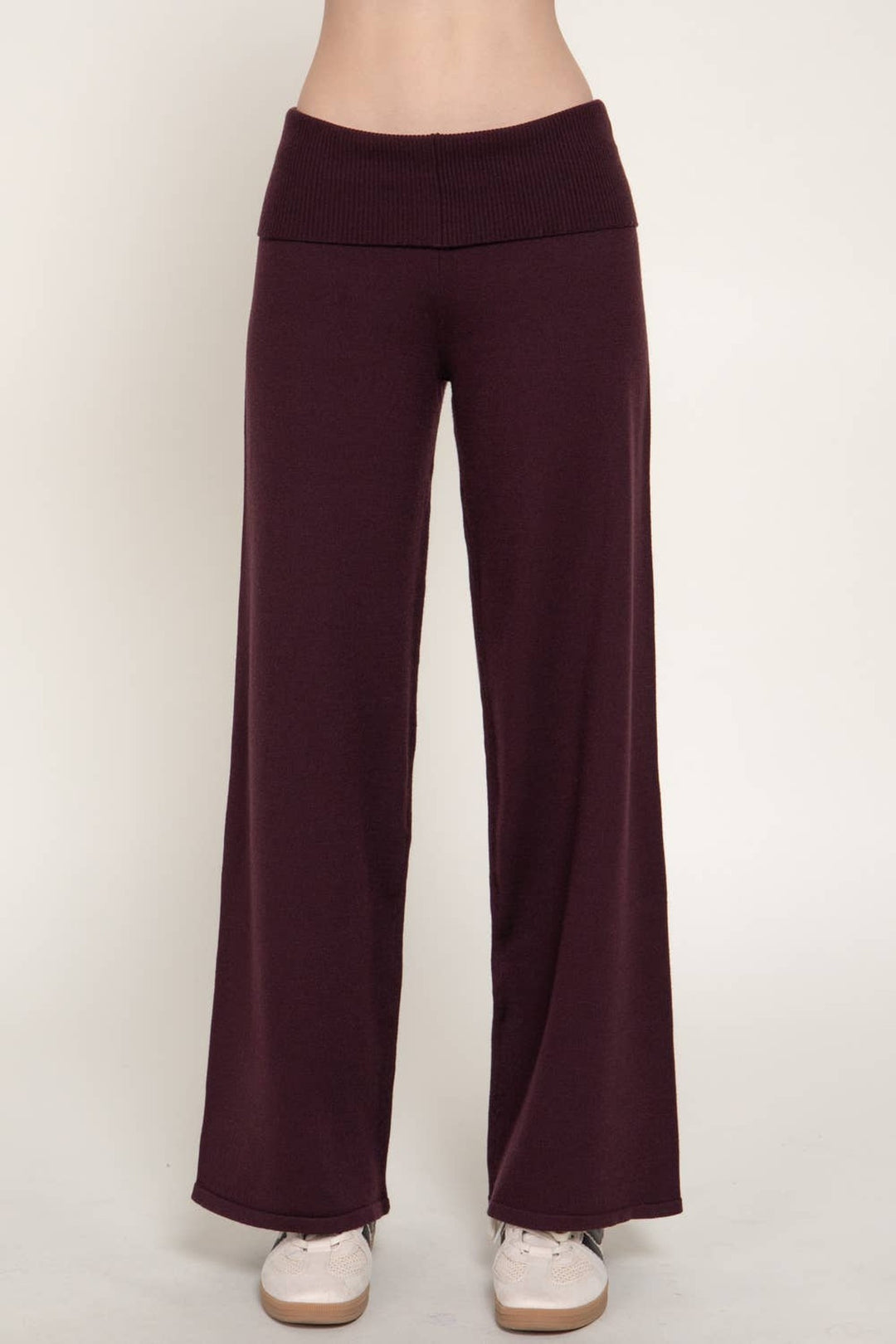 Front view of the burgundy fold over waist knit pants, a Thanksgiving weekend look