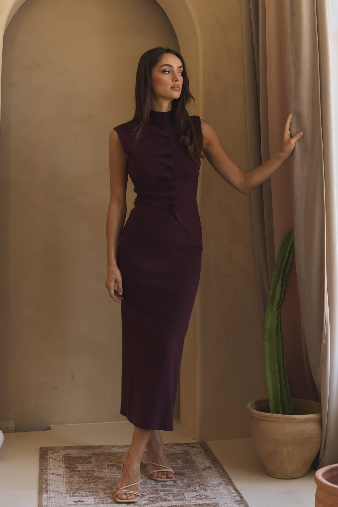 Burgundy sweater top and skirt set, three-quarter view